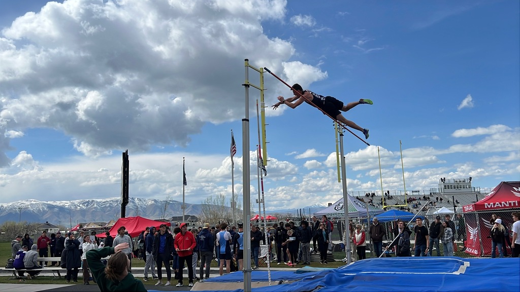 JAY STEED POLE VAULTING AND BREAKS SCHOOL RECORD.