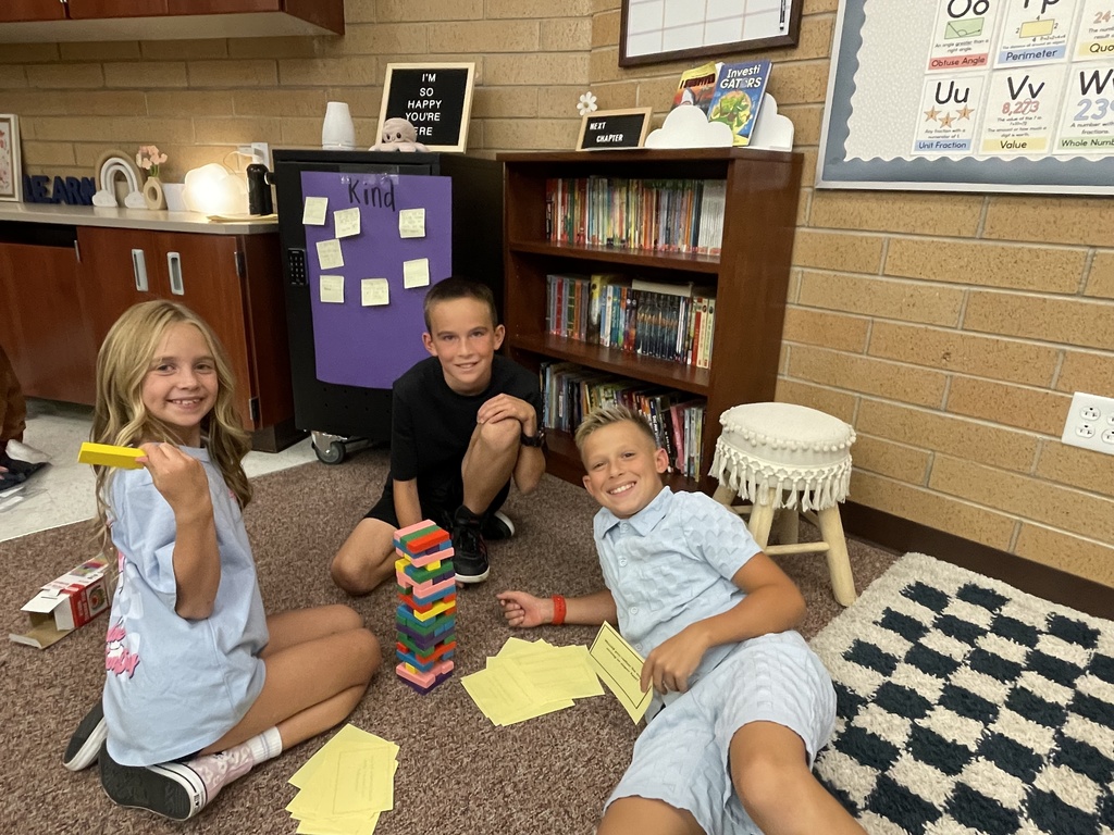 Ms. Vela's 4th grader's playing "Would you rather Jenga."