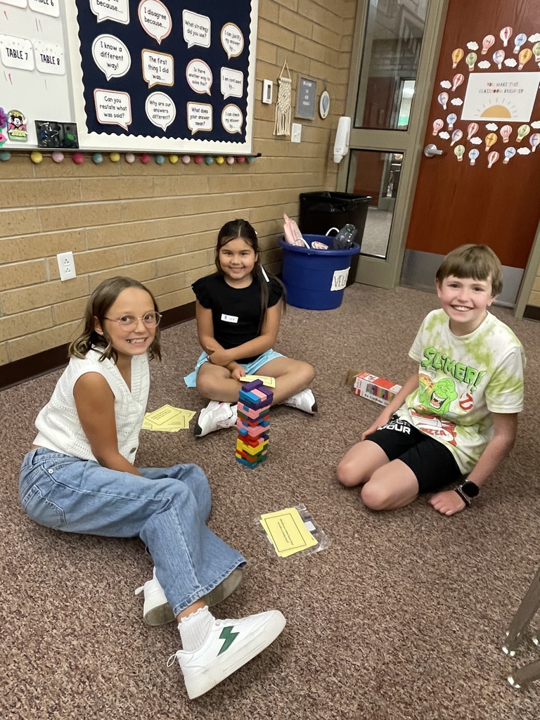Some of Ms. Vela's students playing a game.
