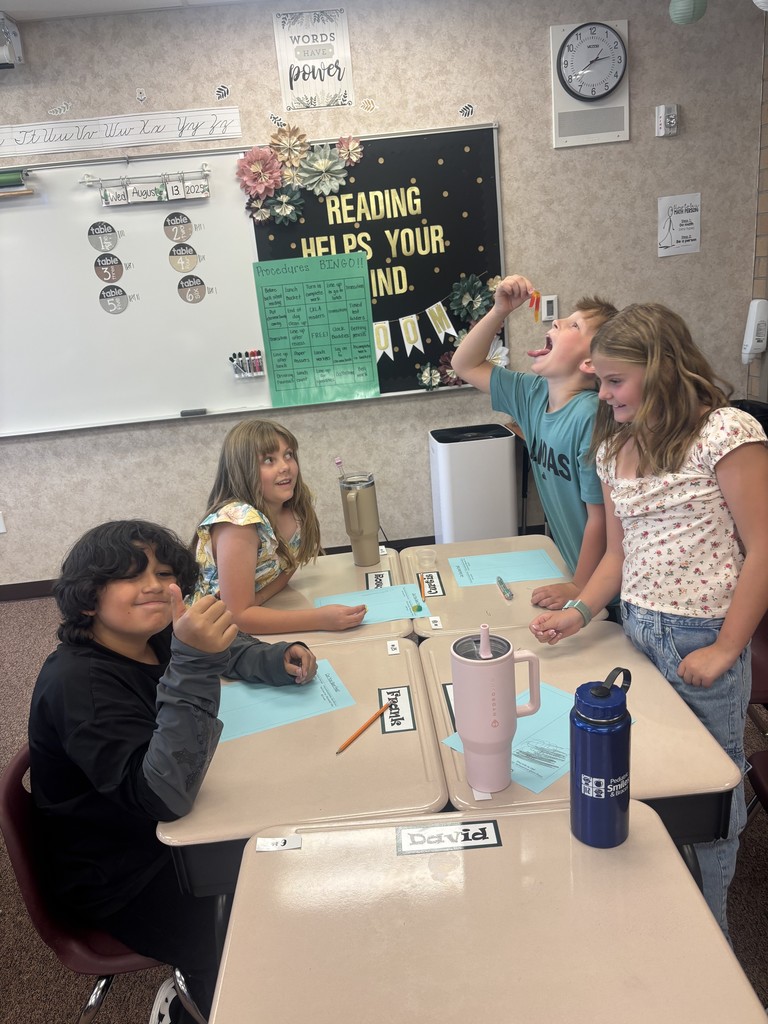 4th graders participating in an activity.