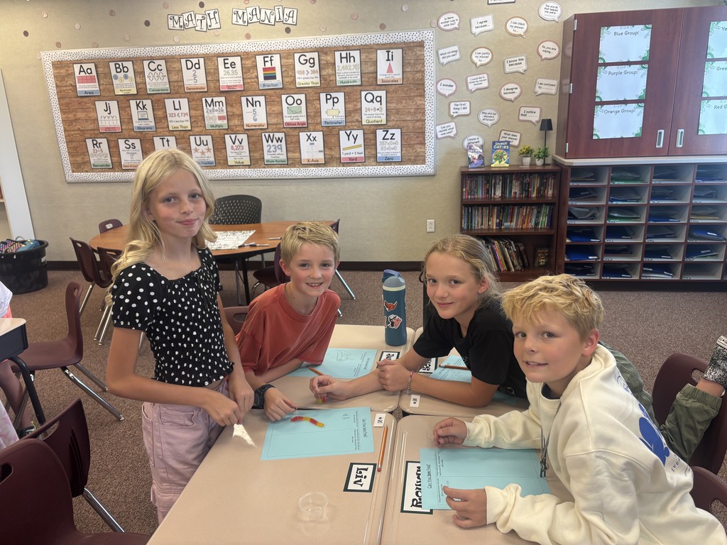 4th graders participating in an activity.