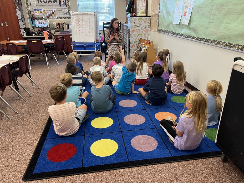Mrs. Steiner reading to a class.