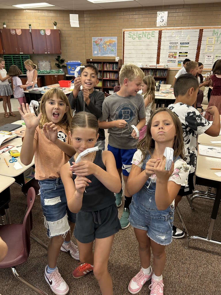 fourth graders with their 'robot fingers'