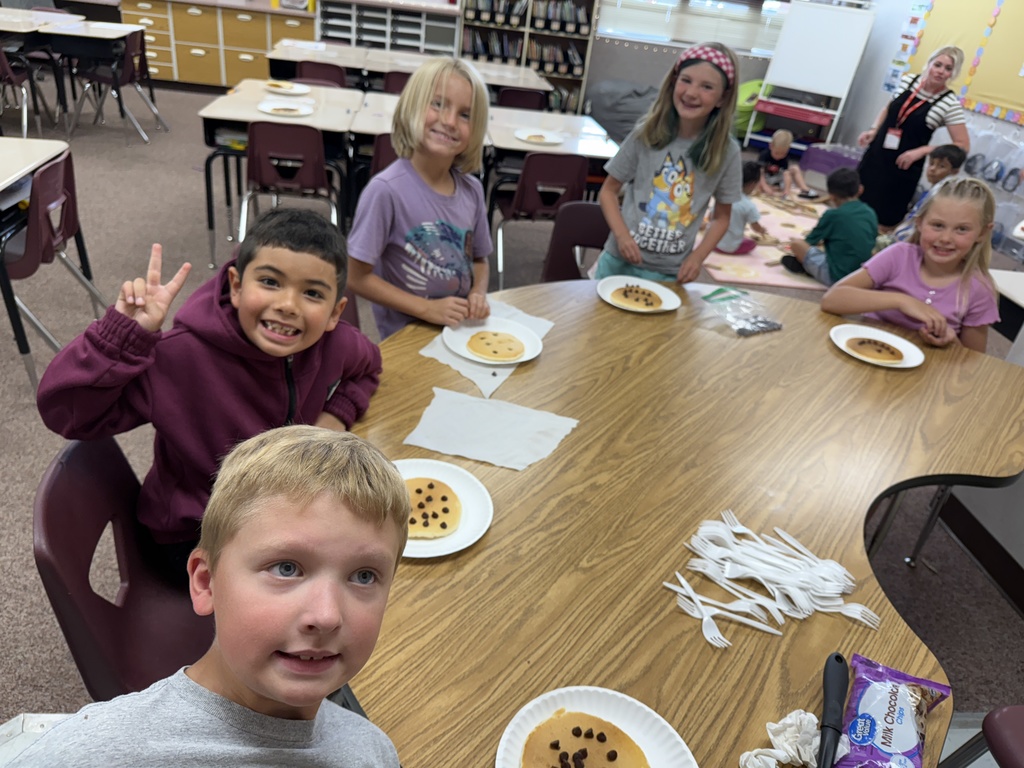 Kids having pancakes