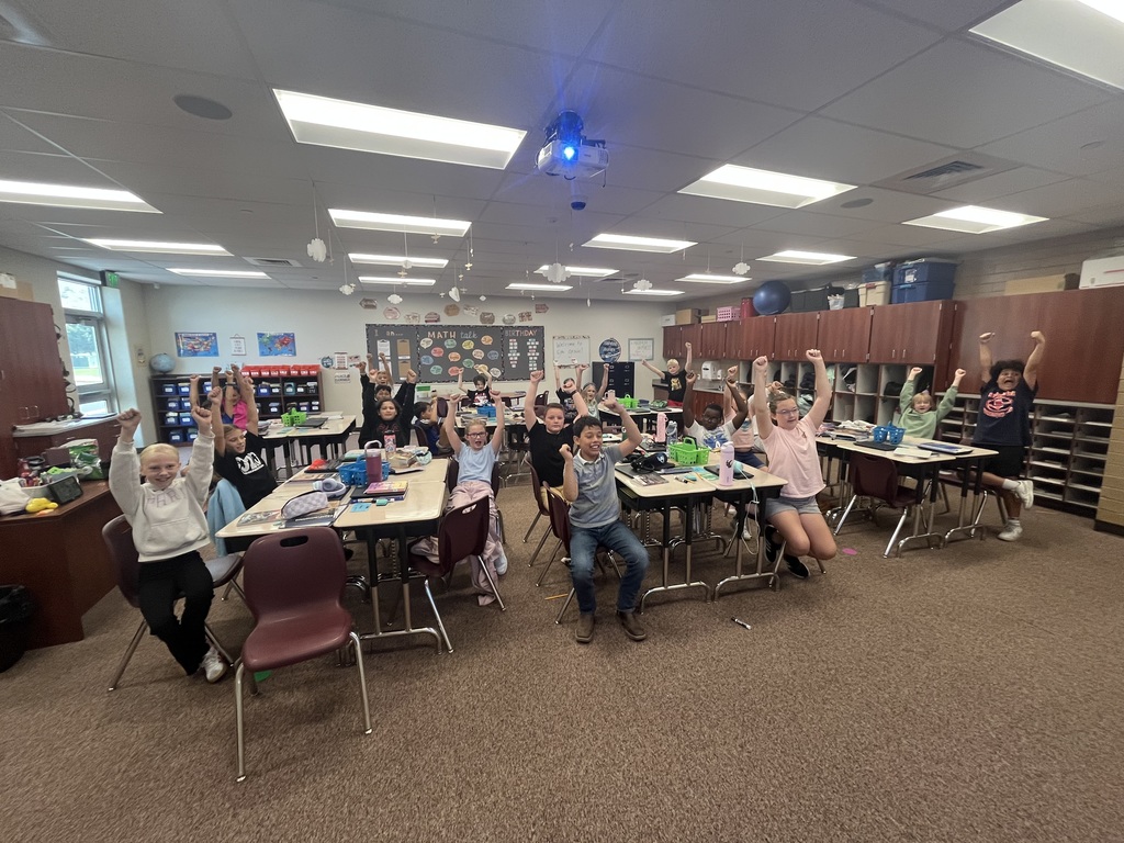 Fifth graders practicing the songs they will sing at Hope of America