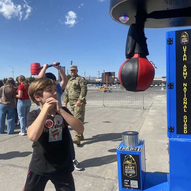 a student with a boxing bag