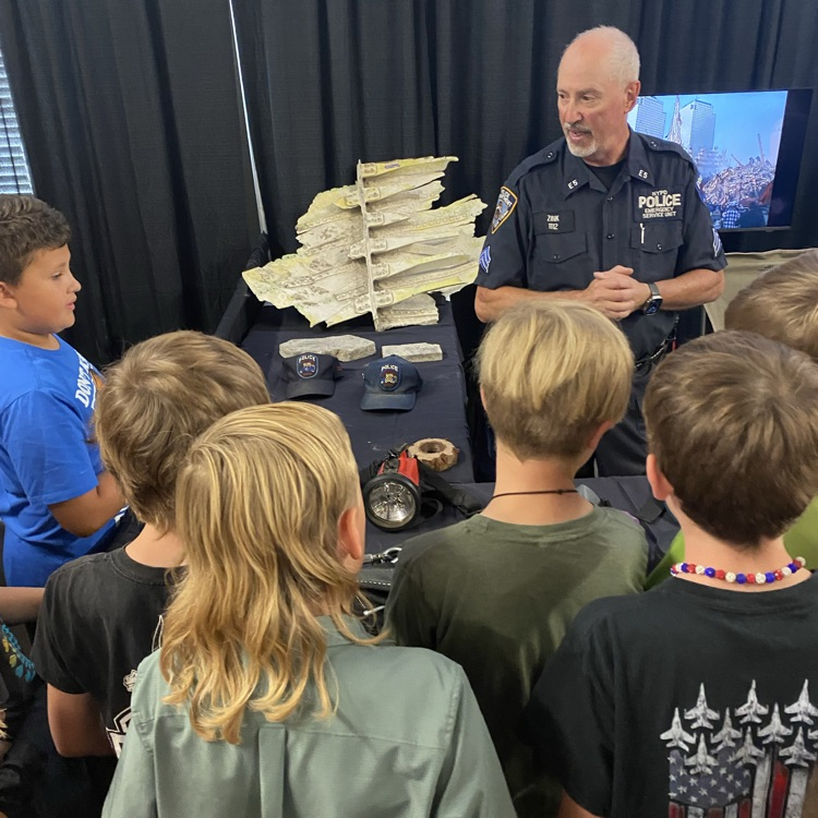 kids listening to a first responder 