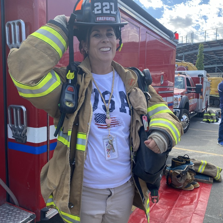Mrs. Christensen dressed as a firefighter 