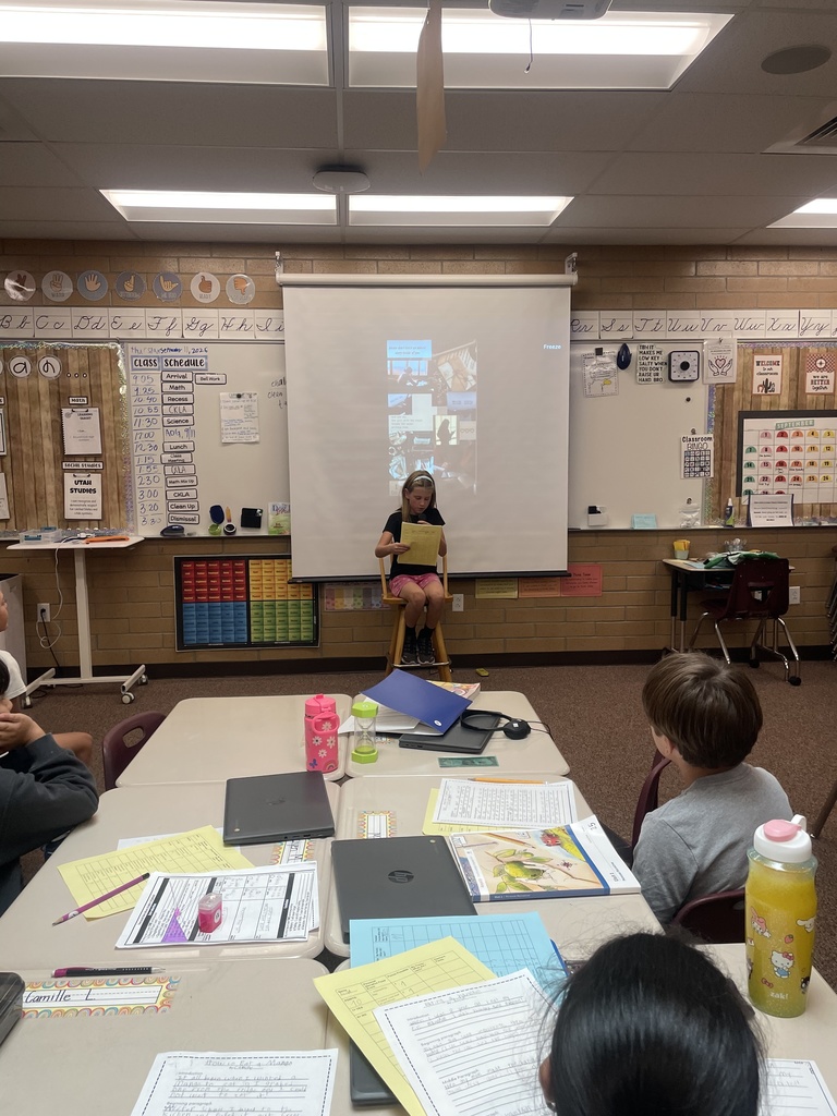 student presenting their narrative to the class