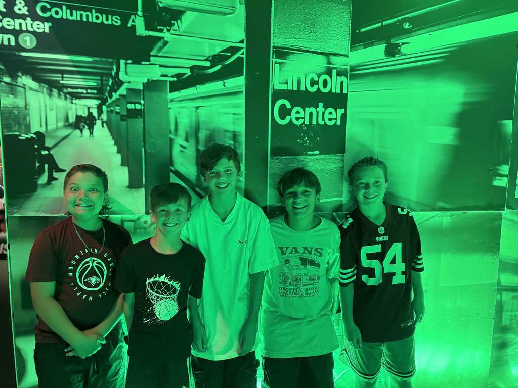 Students in front of one of the exhibits on the field trip.