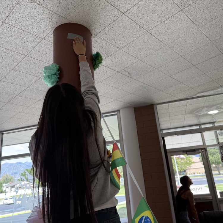 student decorating halls