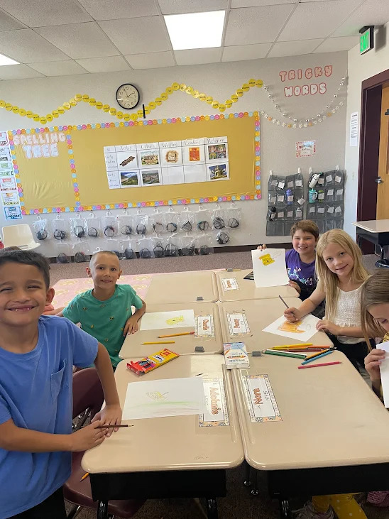 students drawing pictures about the constitution