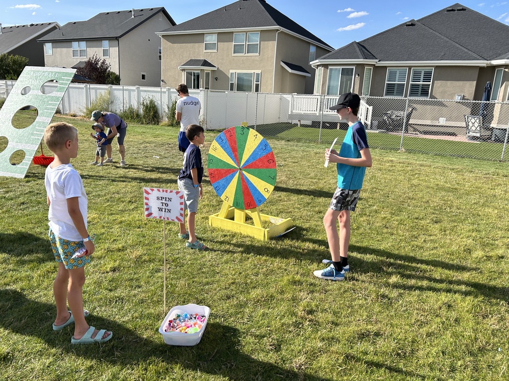 Students playing a spinner game.