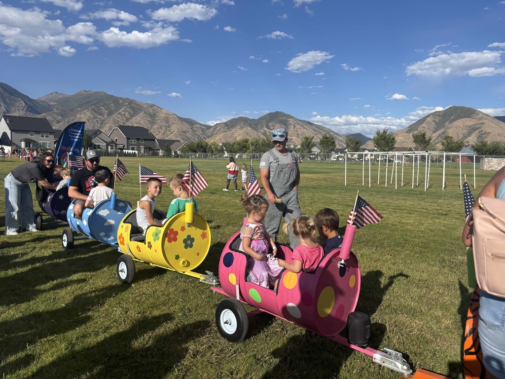Students riding on a train.