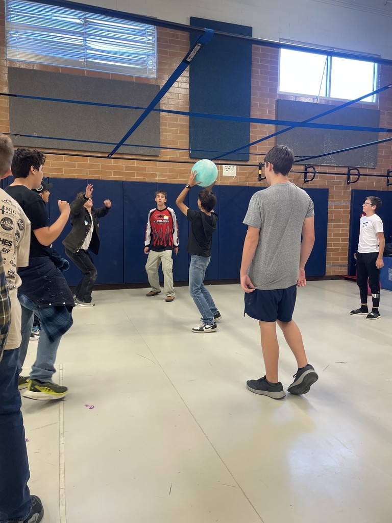 Students playing 9 square