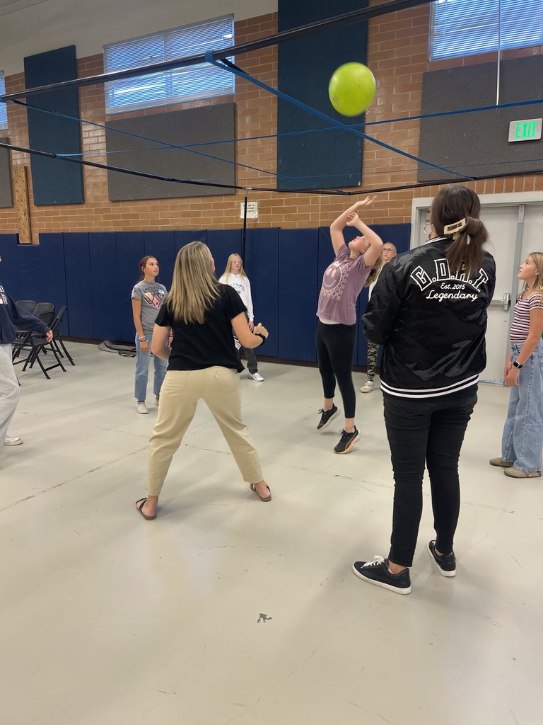 Students playing 9 square