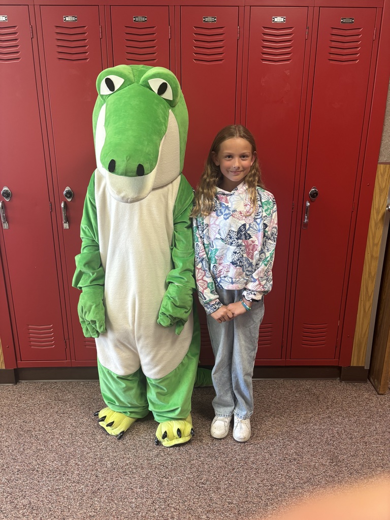 3rd Grade Saves Croc Cash for a Picture with Crocky