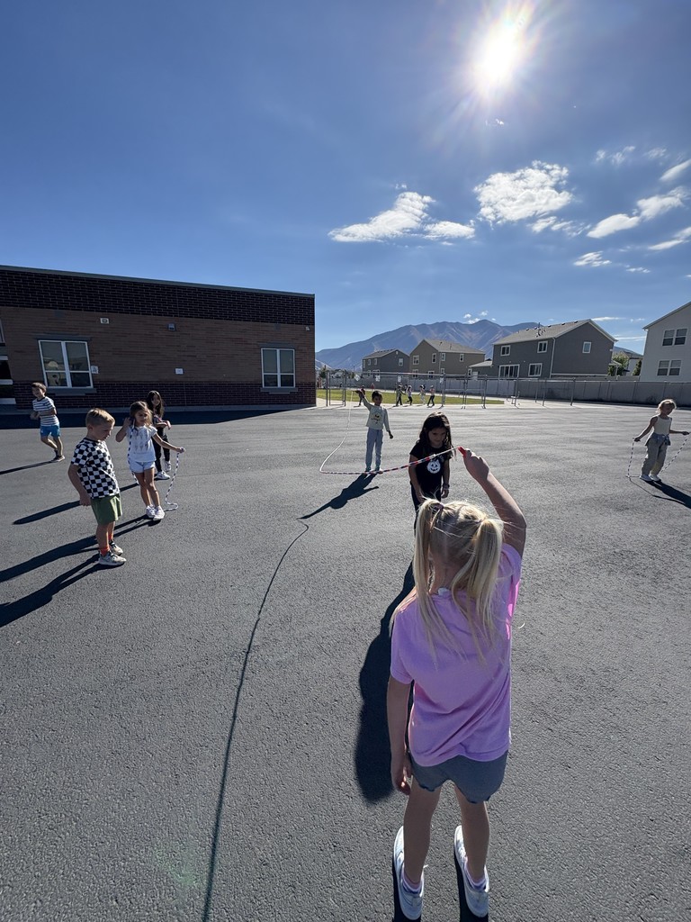 students playing jump rope