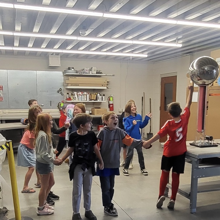 students feeling electricity flowing through themselves 
