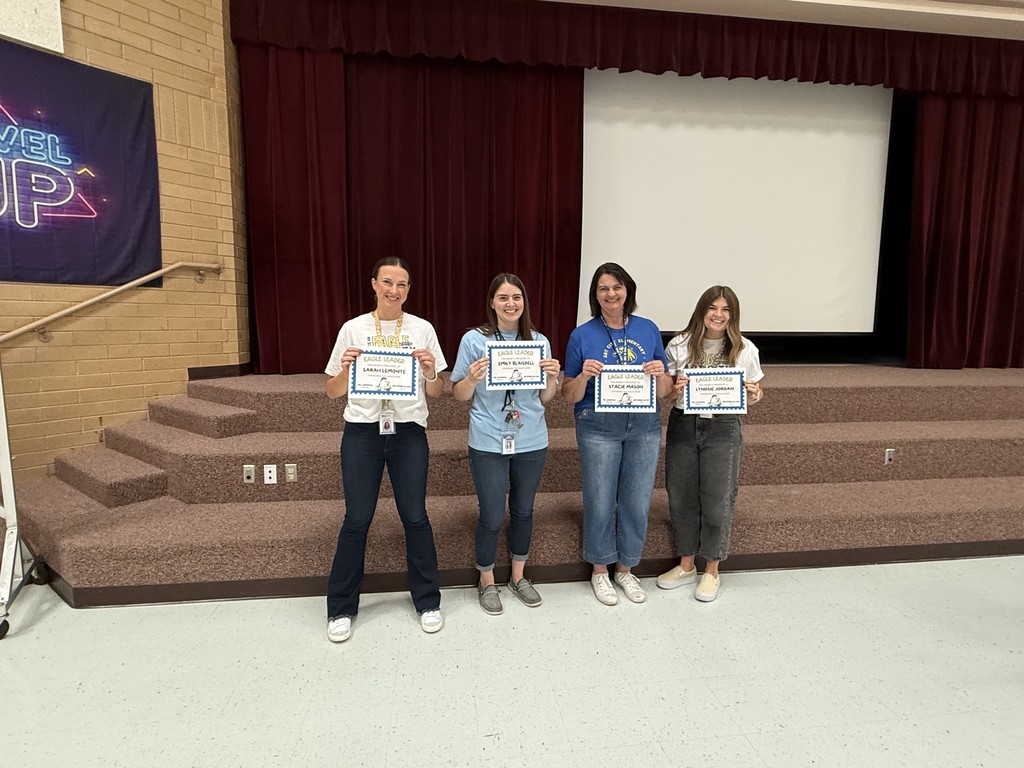 Sarah LeMonte, Emily Blaisdell, Stacie Mason, and Lyndsie Jordan recieving  the Stand Strong Staff award