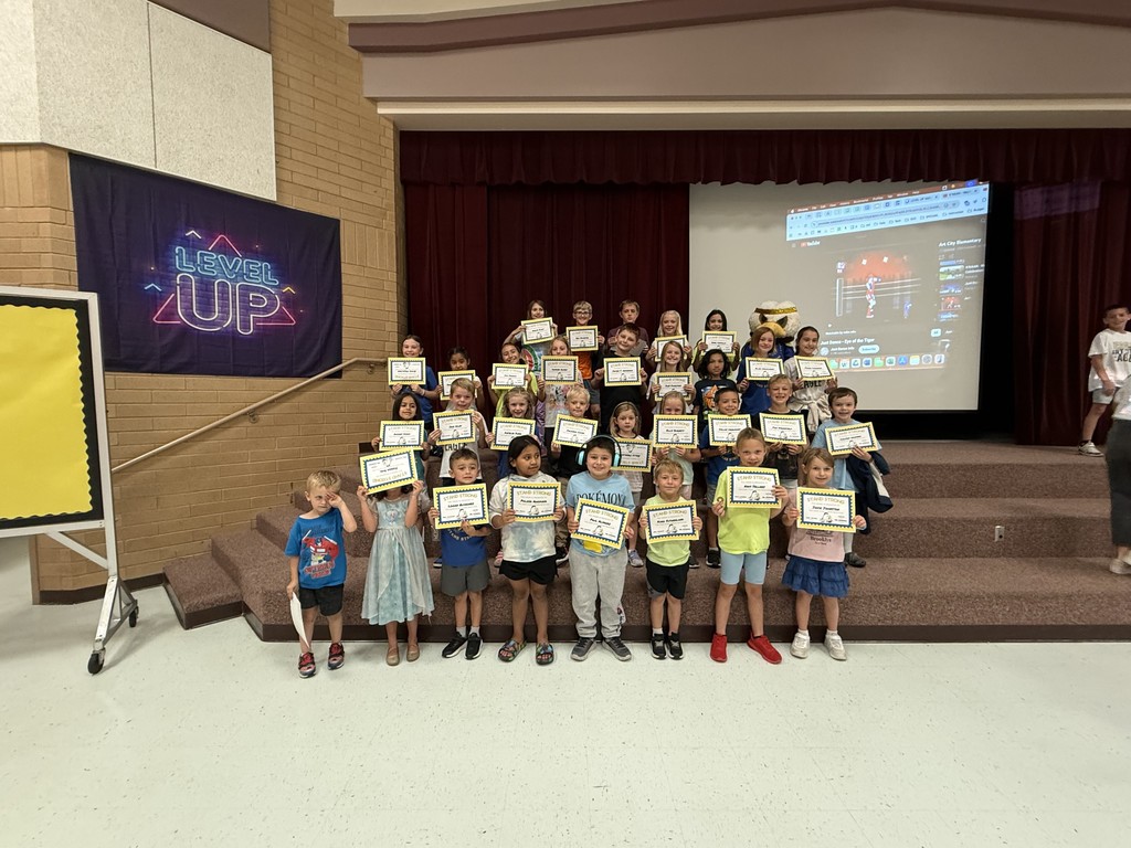 Stand Strong Students holding their certificates for Stand Strong Students of the month