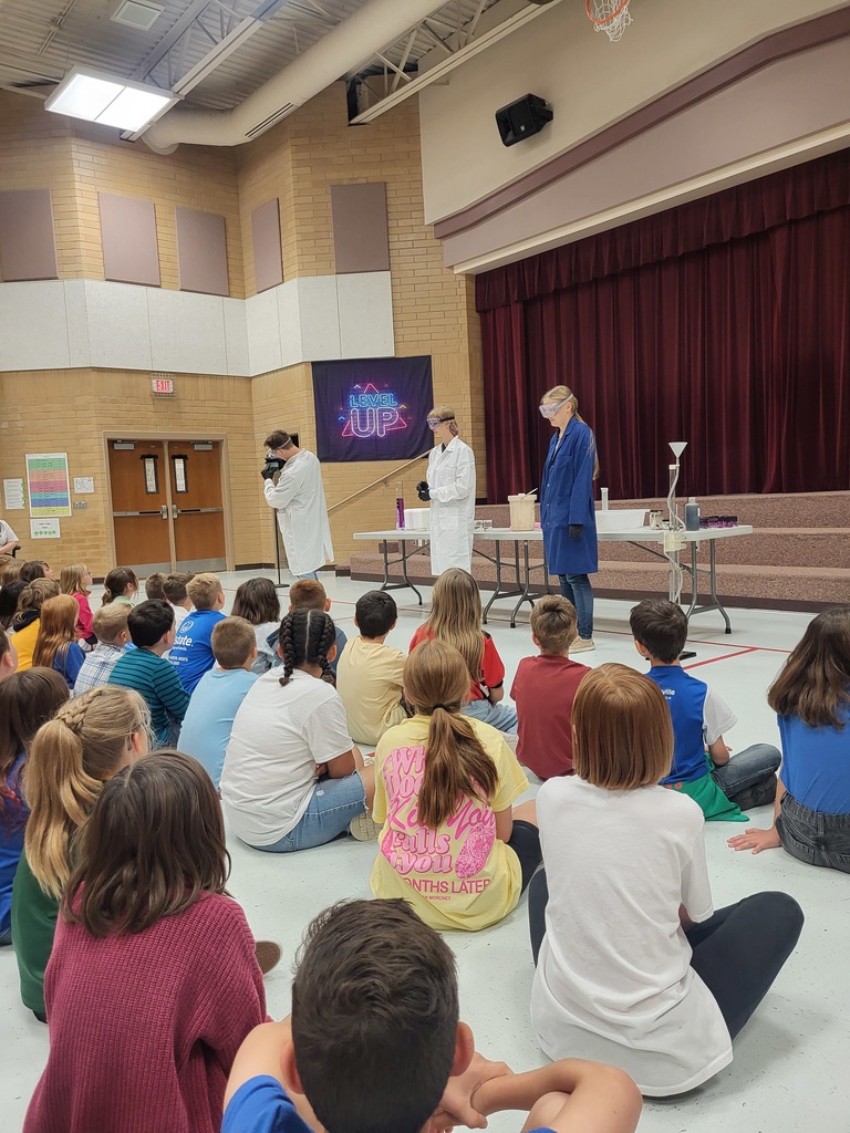 BYU Students teaching Science to fourth grade students 