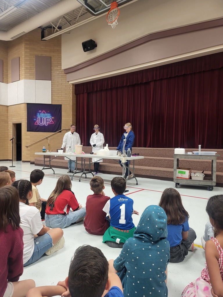 BYU Students teaching Science to fourth grade students 