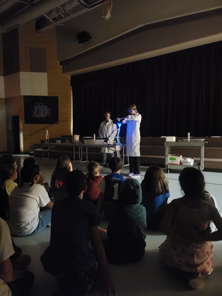 BYU Students teaching Science to fourth grade students 