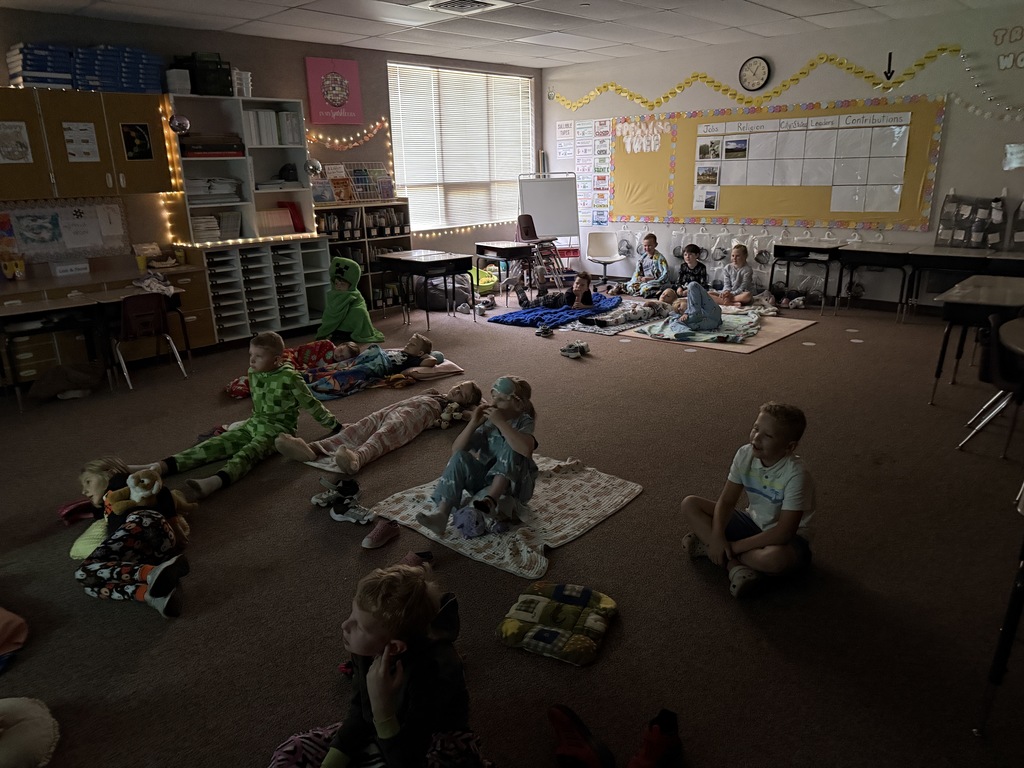 2nd grade students watching kung fu panda for a term party