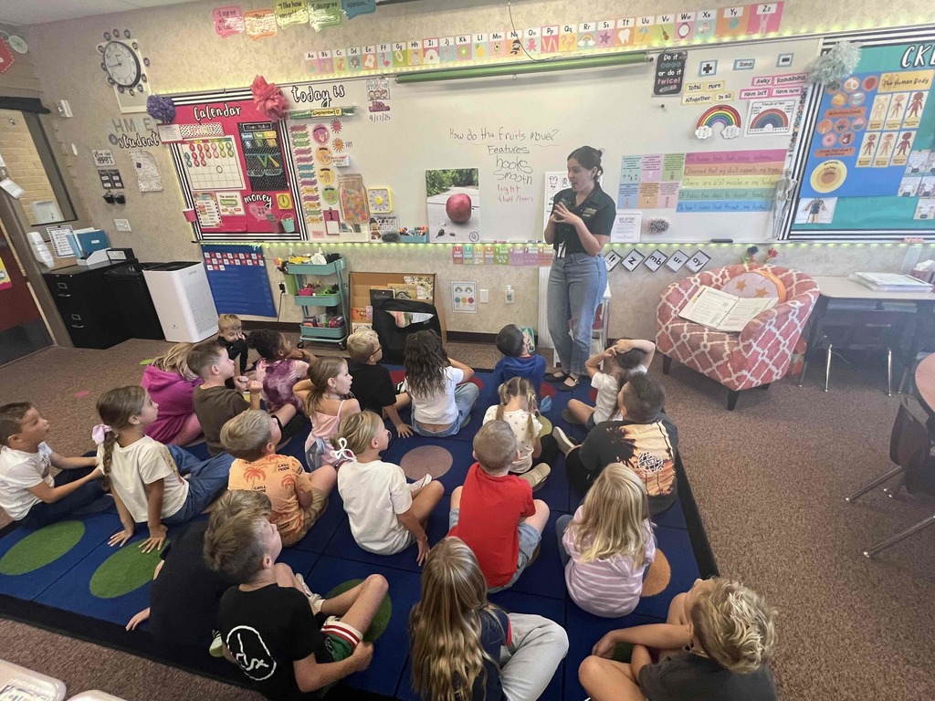 Red Butte Garden representative teaching in a first grade classroom.
