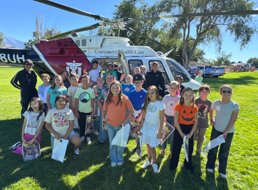 Students with the Air Med helicopter and crew