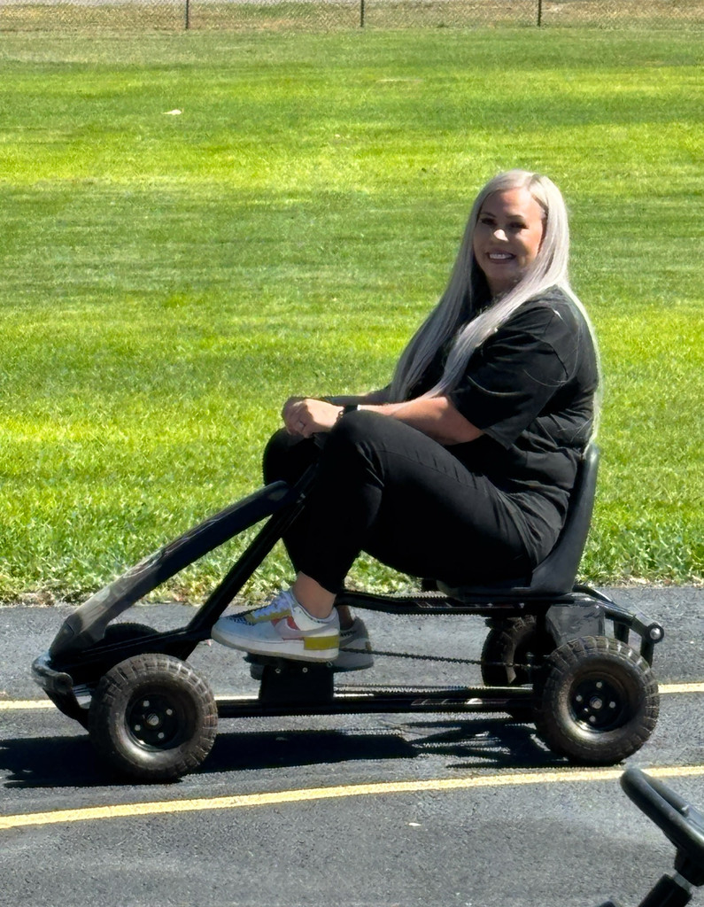 Mrs. Oropeza on a go cart