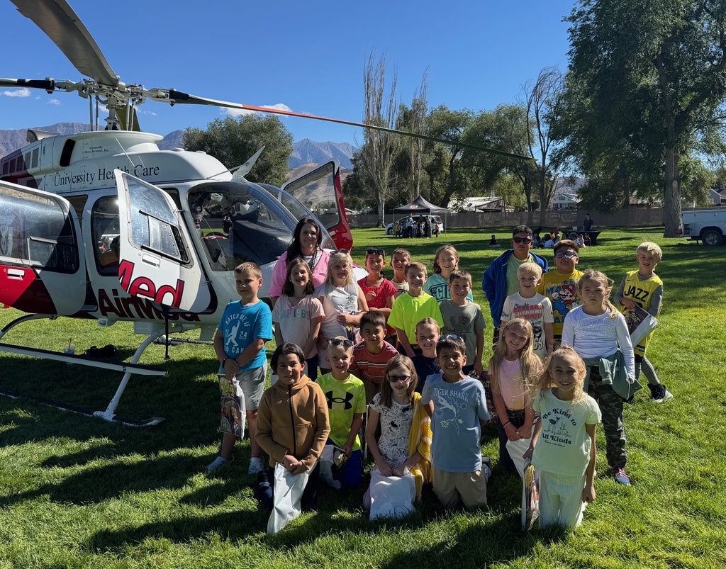 Students with AirMed helicopter