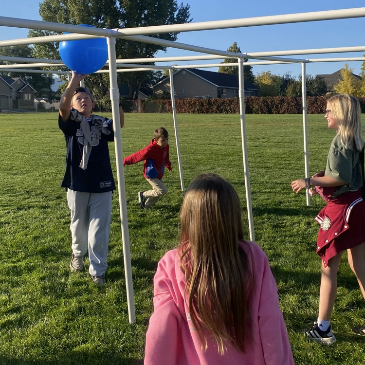 3 kids playing 9 square
