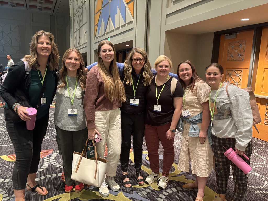 teachers posing for a picture at a conference