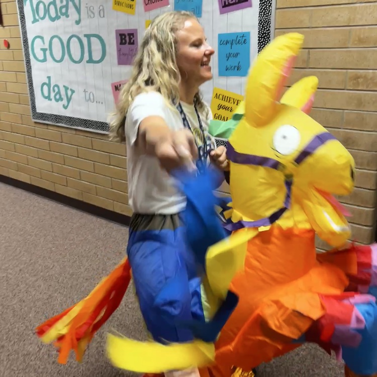 Mrs. Park dancing in celebration of the students 