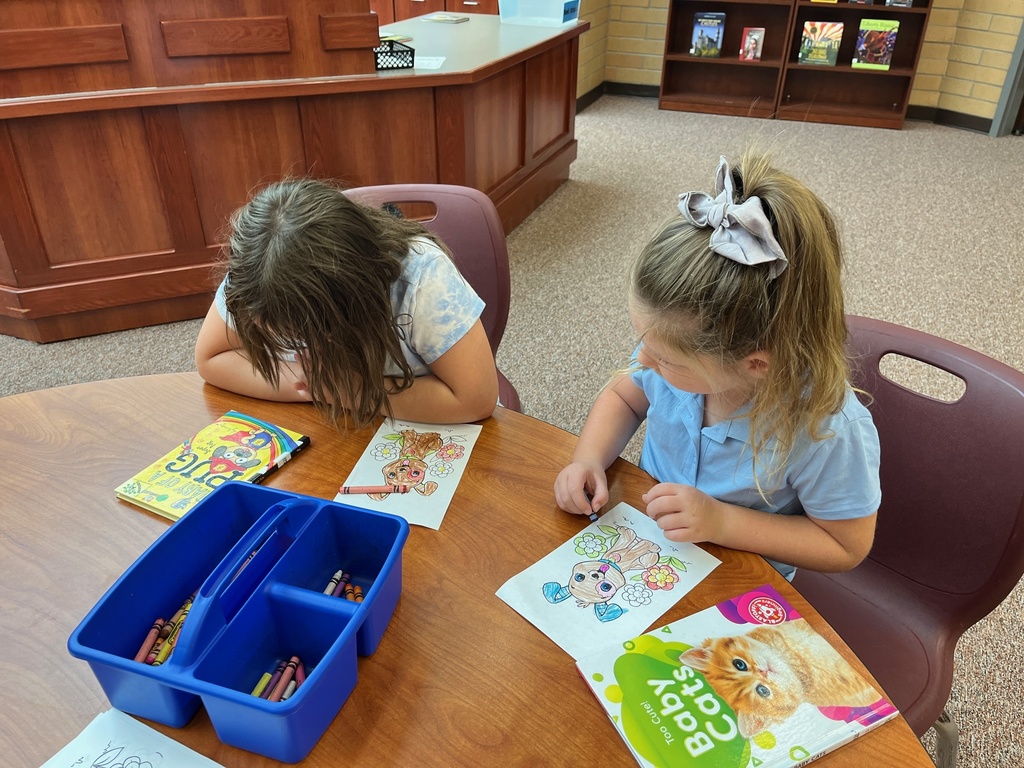 students reading at the table