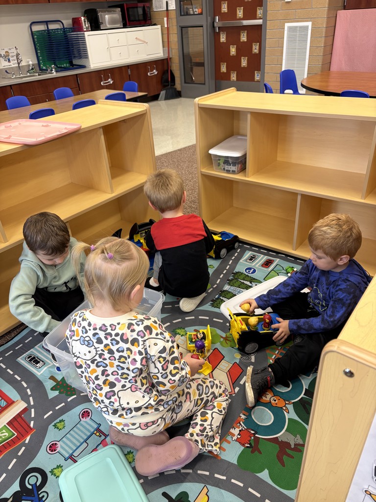 students playing with toys