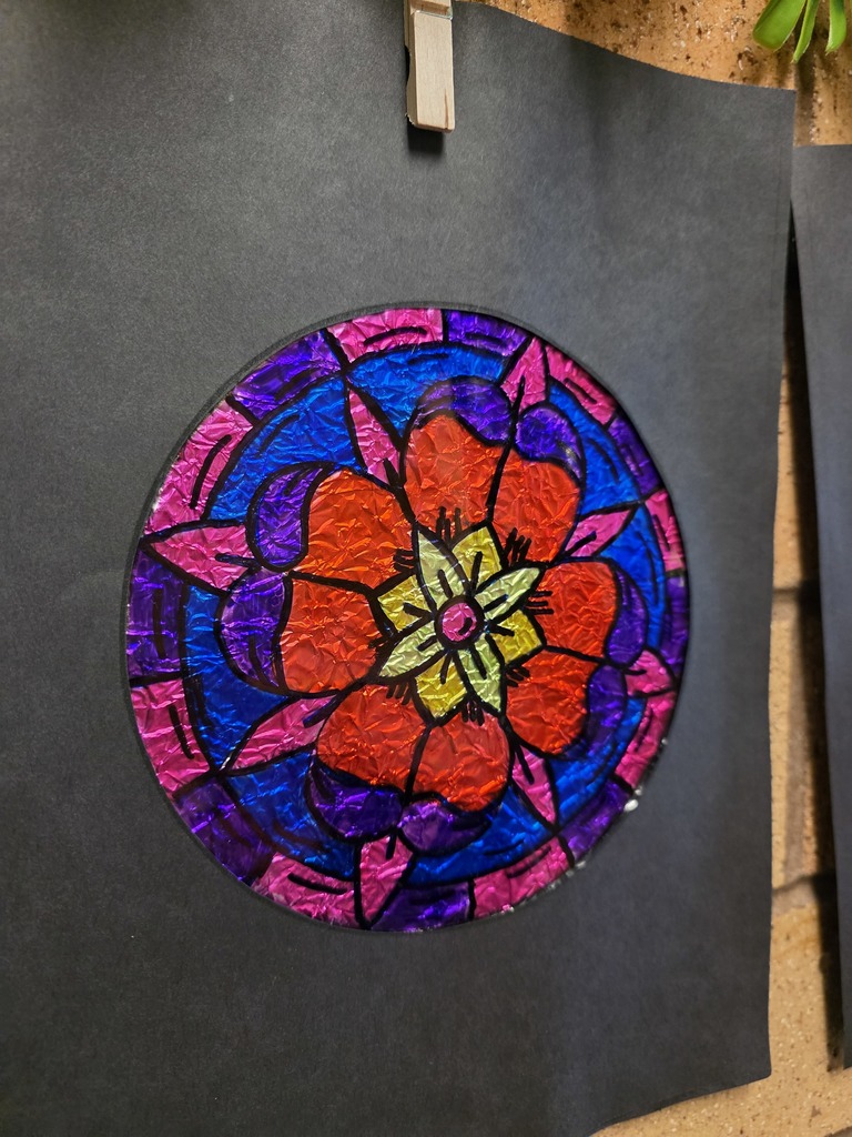 stained glass artwork by 4th grade