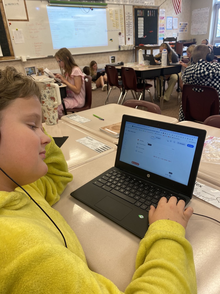 Student working on his chromebook.