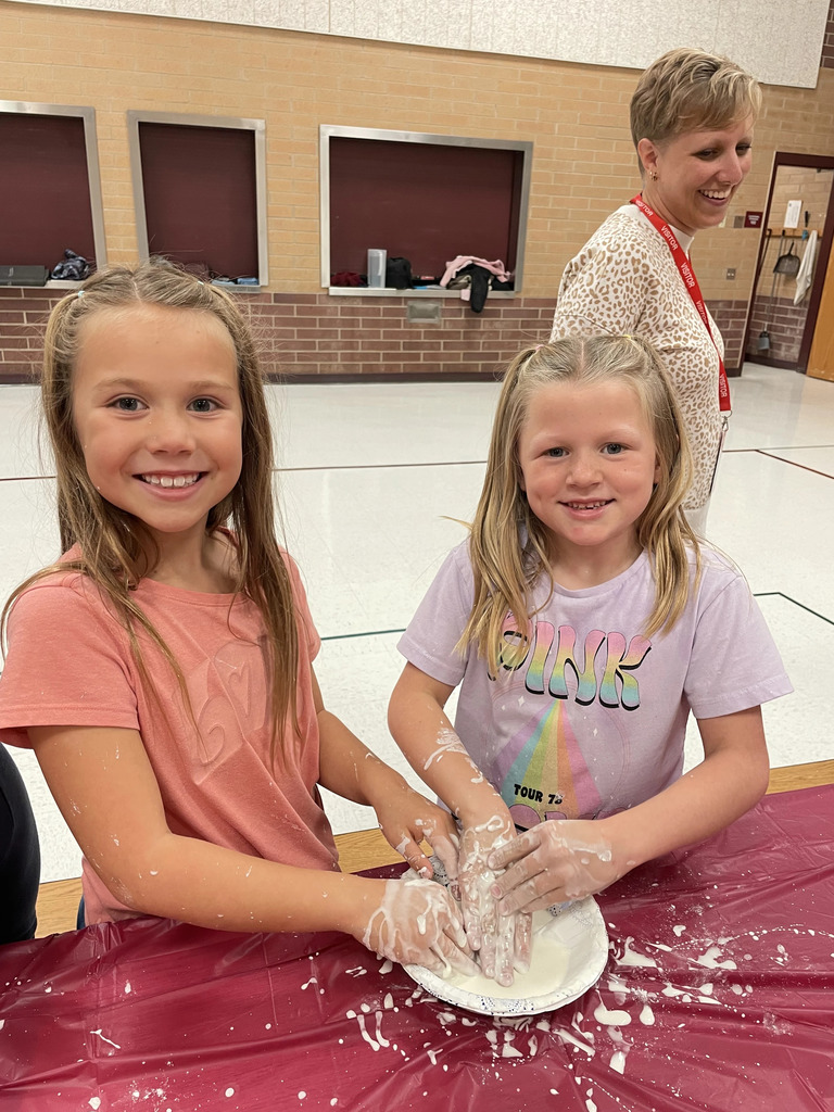 students touching oobleck