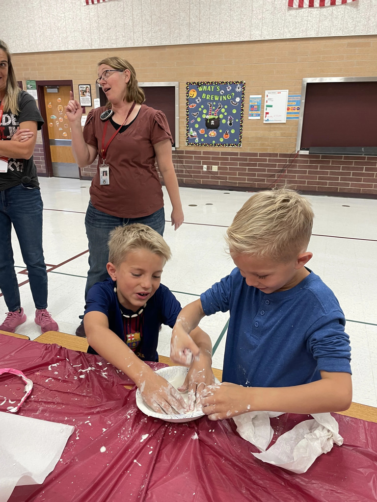 Students playing with oobleck