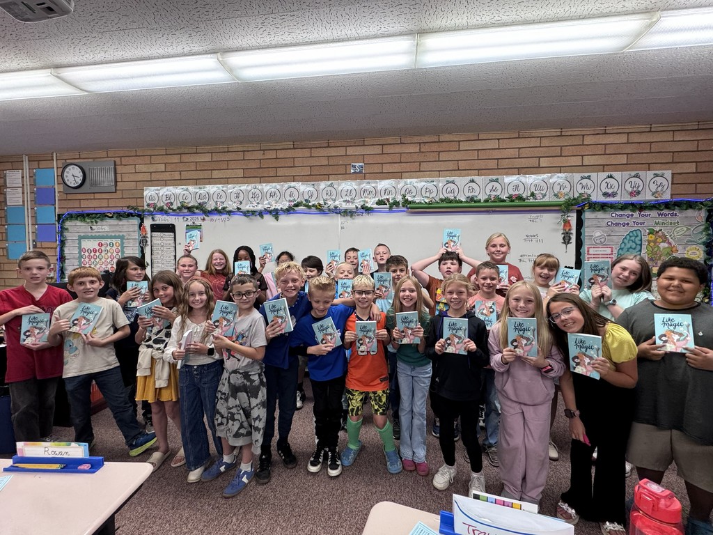 students receive books to keep