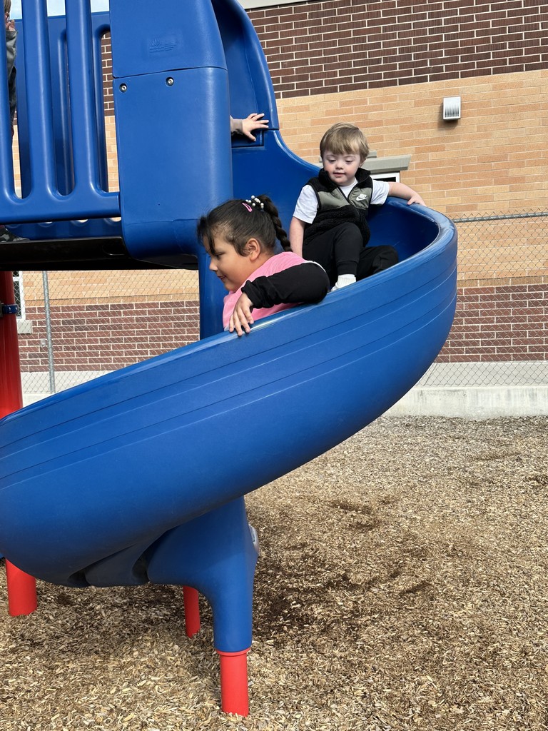 preschoolers playing on playground