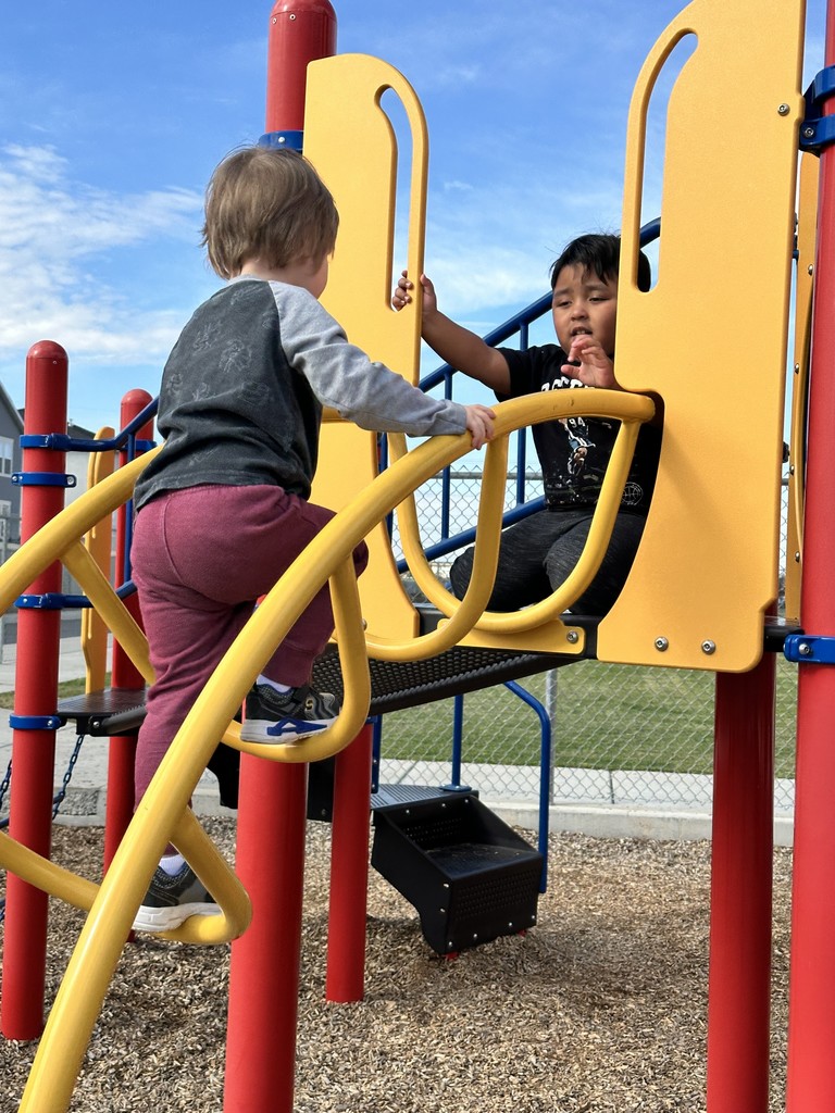 preschoolers playing on playground