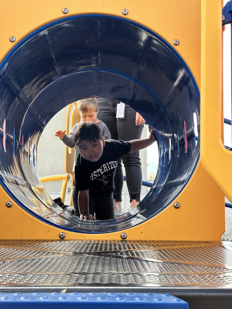 preschoolers playing on playground