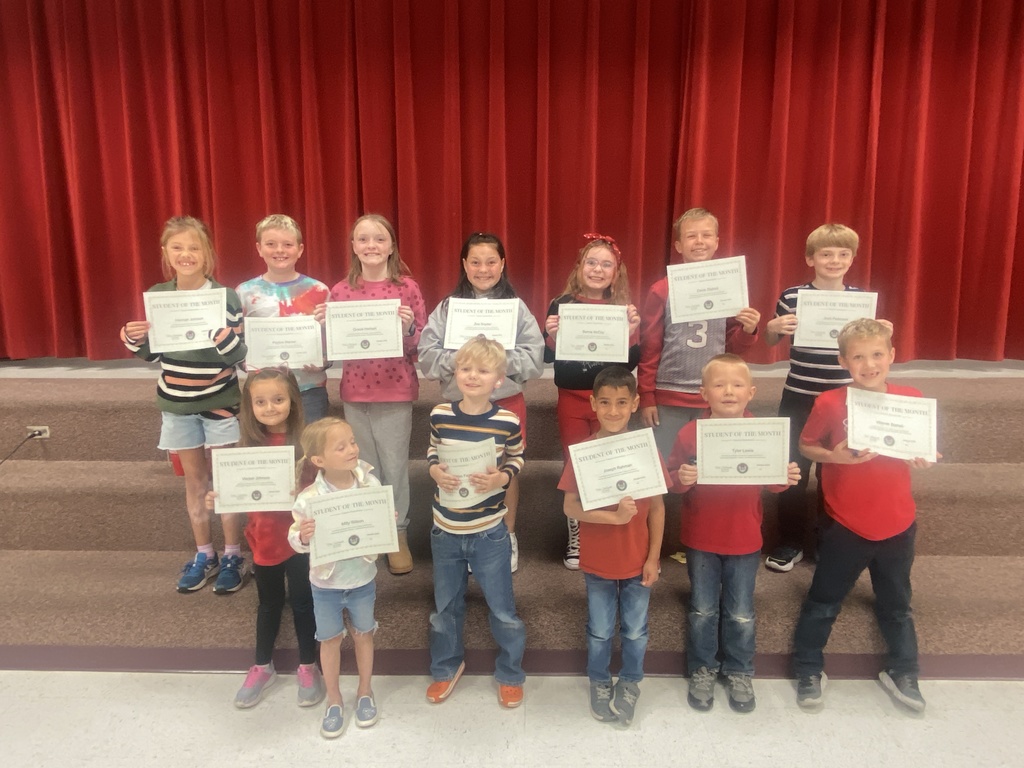 Picture of students holding certificates