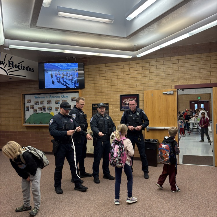 police officers handing out stickers