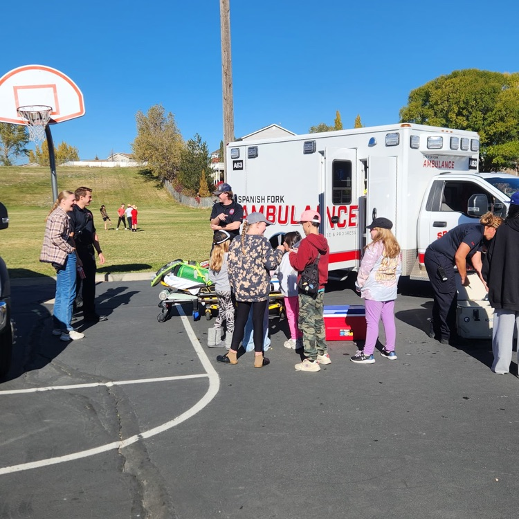 emts showing students how they tranport people