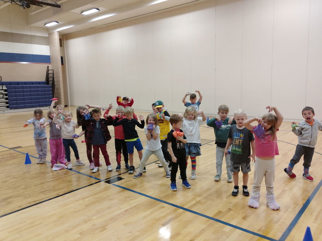 Kids playing in the gym.